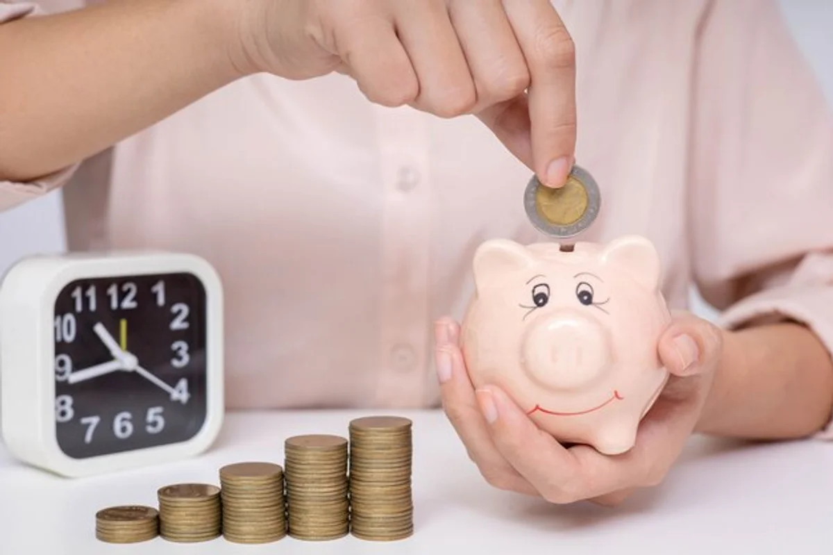 emergency fund piggy bank with alarm clock