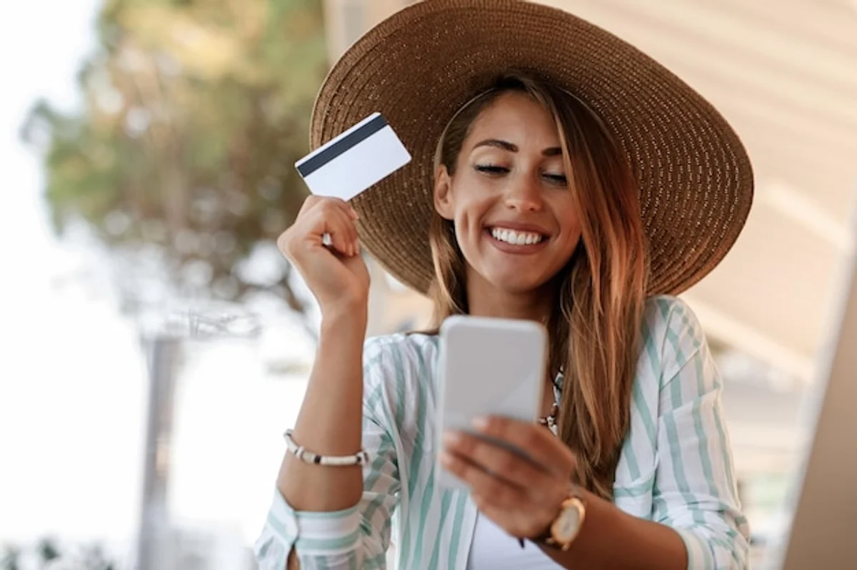 relaxed person checking savings account on smartphone
