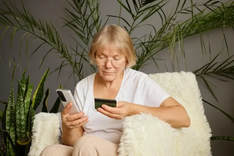 senior using smartphone for secure online shopping
