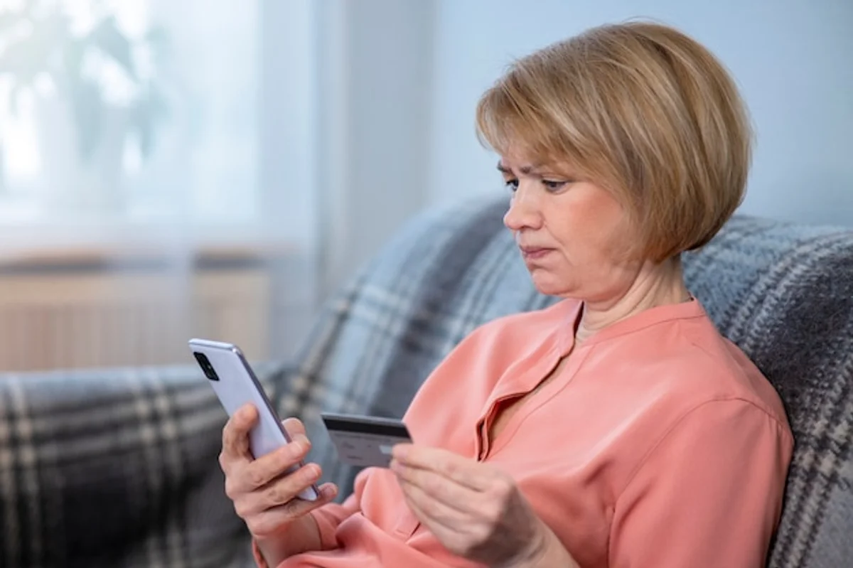 elderly woman shopping online smartphone secure