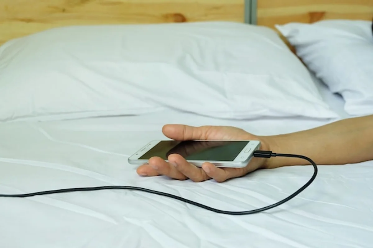 phone charging overnight modern bedroom