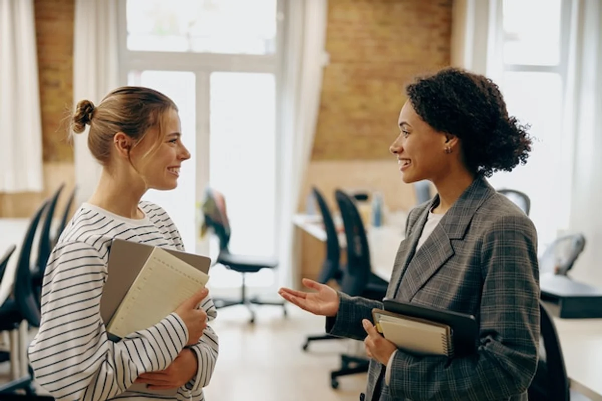 business meeting relaxed face-to-face conversation office break