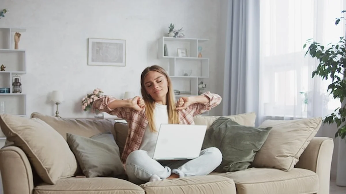 relaxed professional woman home office sunny
