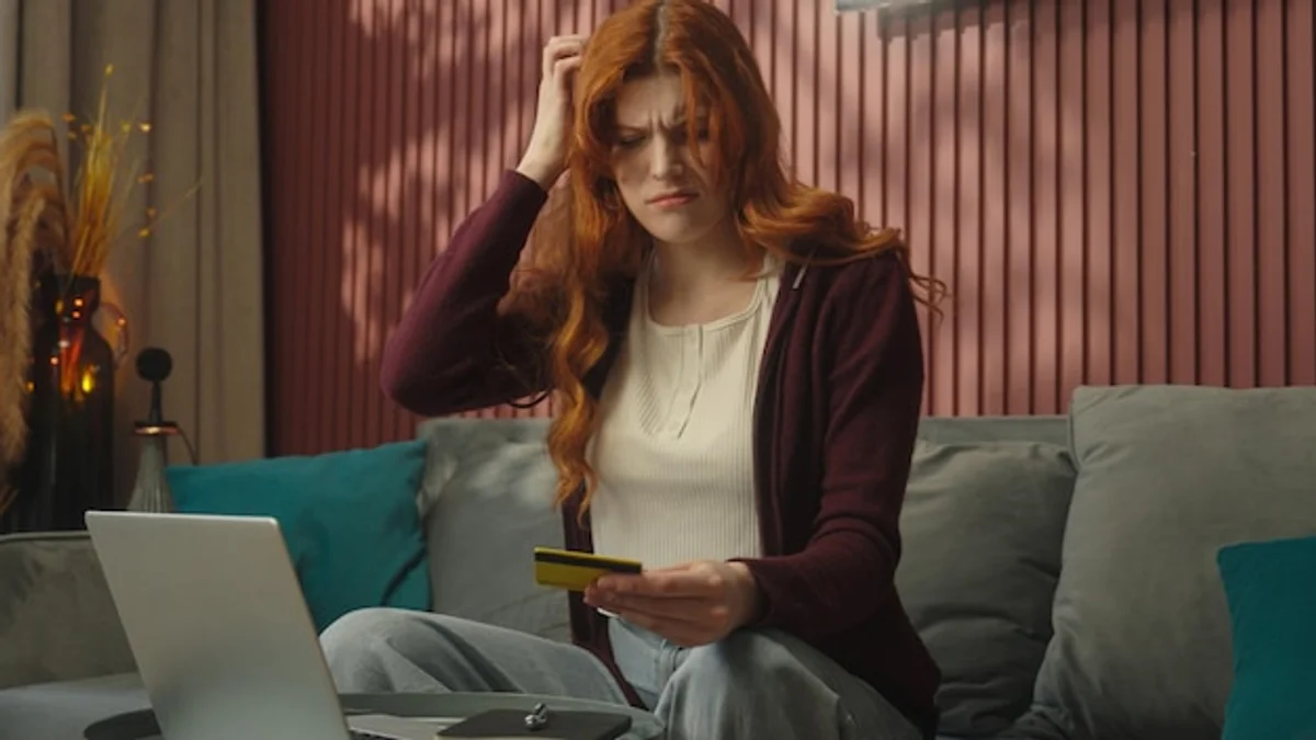 hotel booking mistake woman laptop