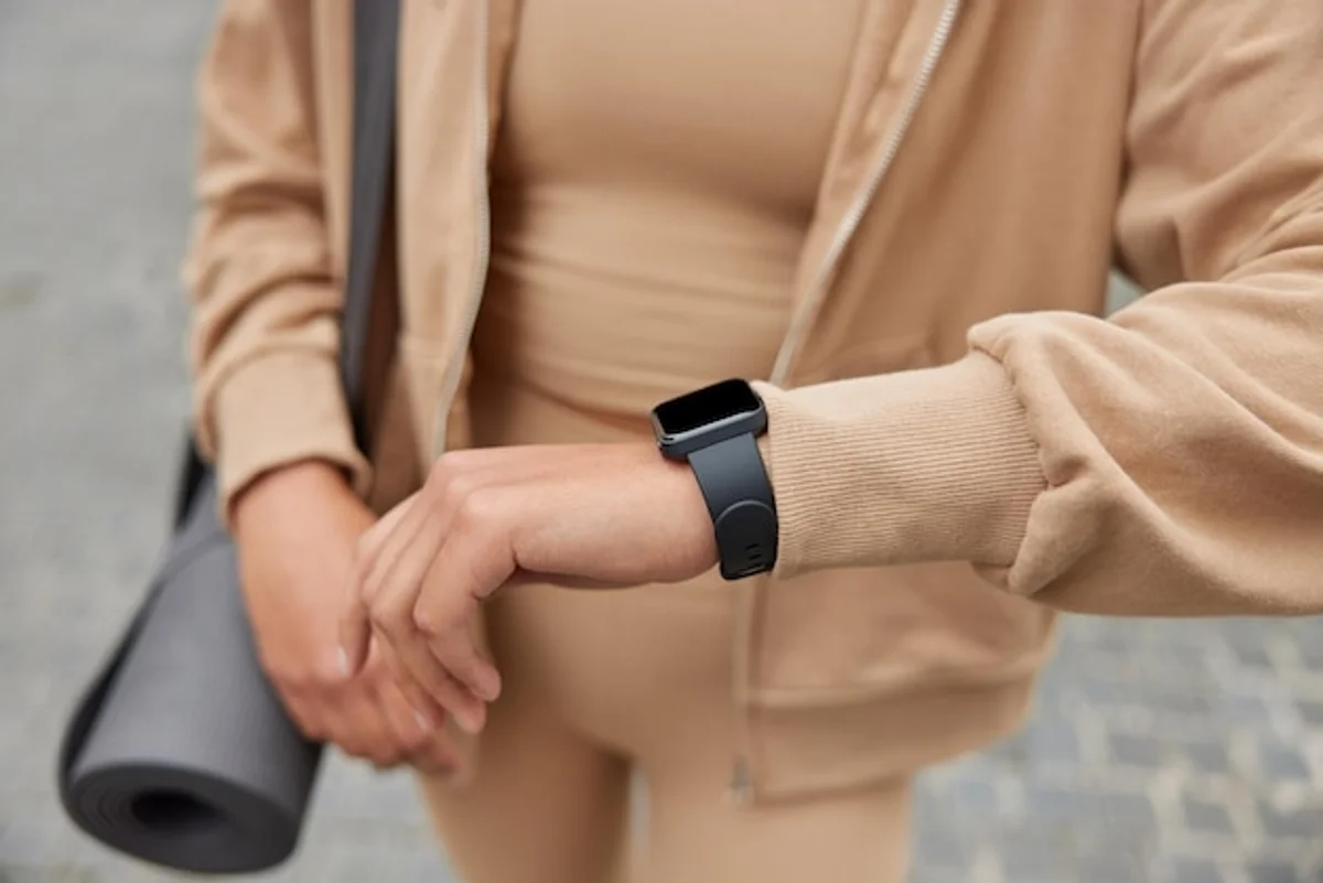 senior couple setting up smartwatch at home smile technology