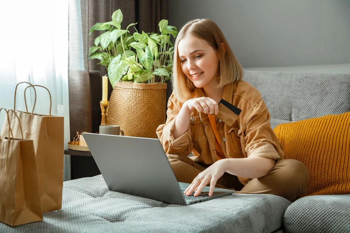 Impulse buying online shopping Germany woman with credit card regret