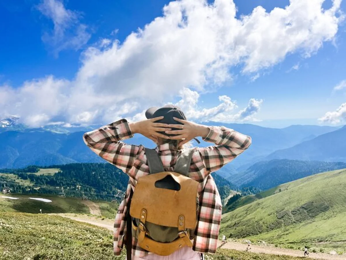 woman alone mountain backpack adventure