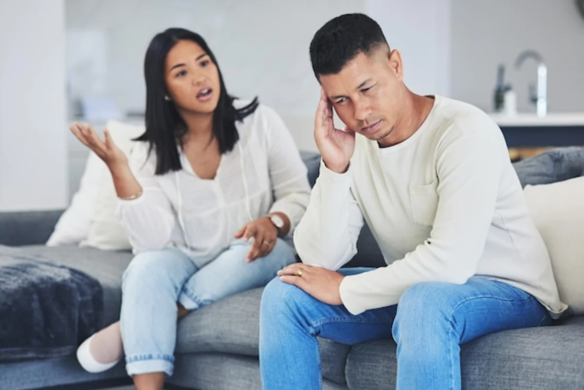 couple communication conflict frustration modern livingroom