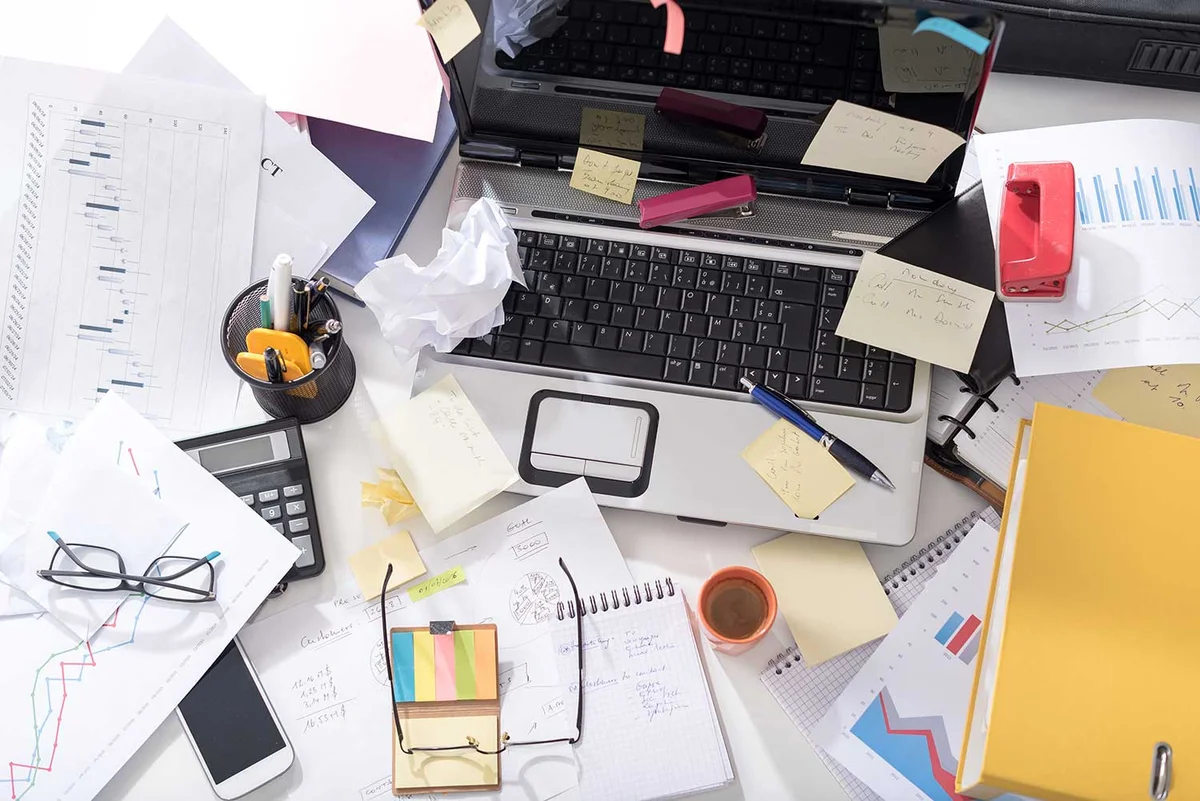 decluttered workspace minimalism save money
