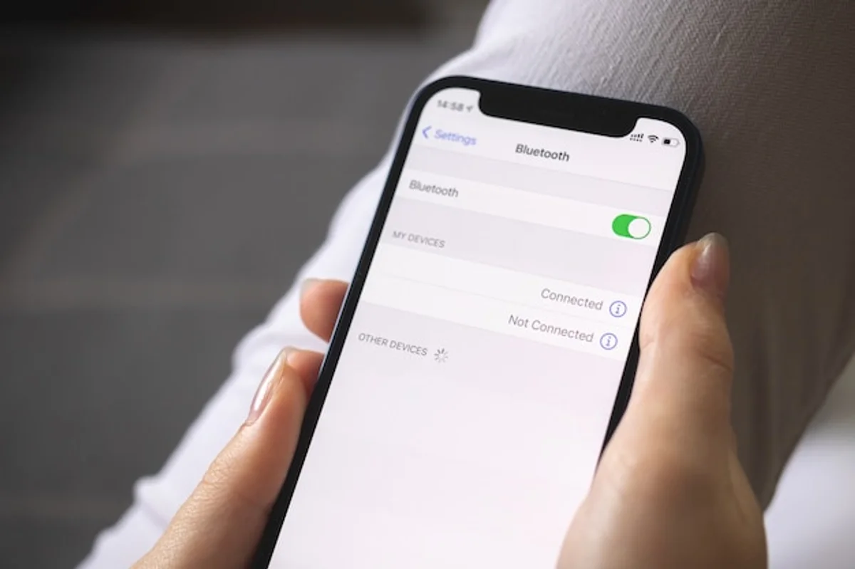 bluetooth settings smartphone close up fingers