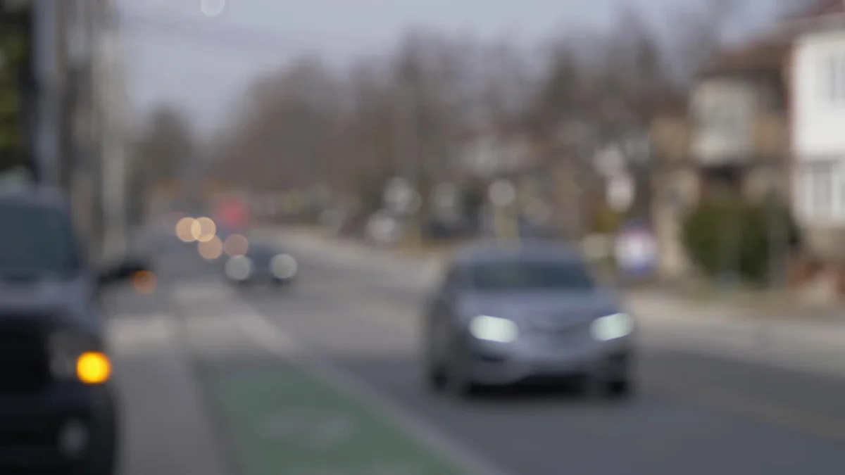 smartphone battery saving real life person using phone german city street