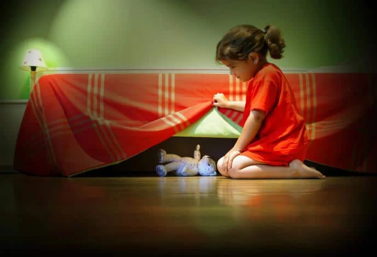 child sleeping in calm feng shui bedroom soft lights