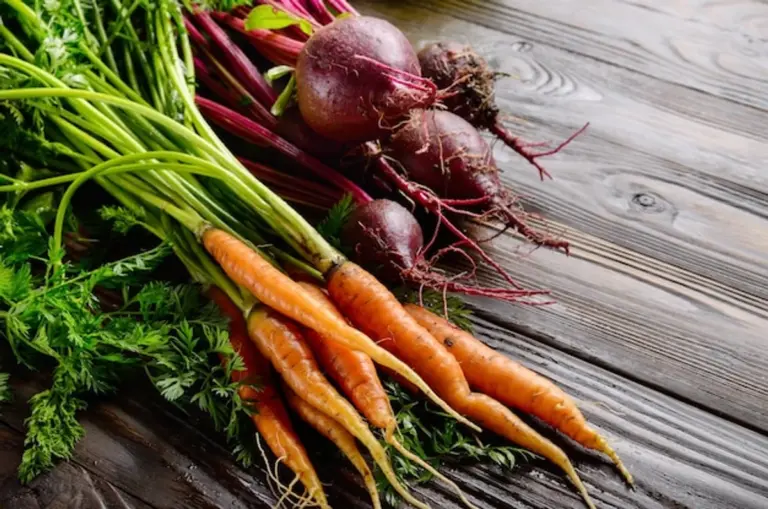old carrots on rustic kitchen table