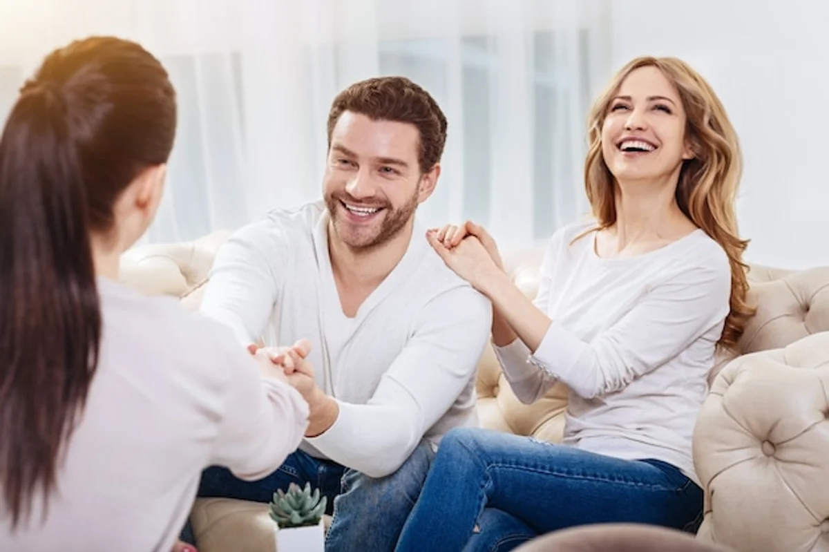 happy couple expressing gratitude at home