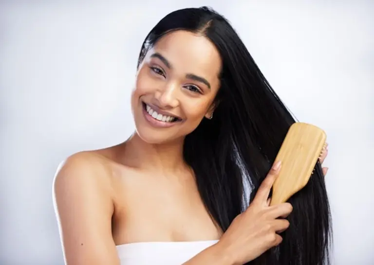 hair loss wrong brushing woman voluminous healthy hair