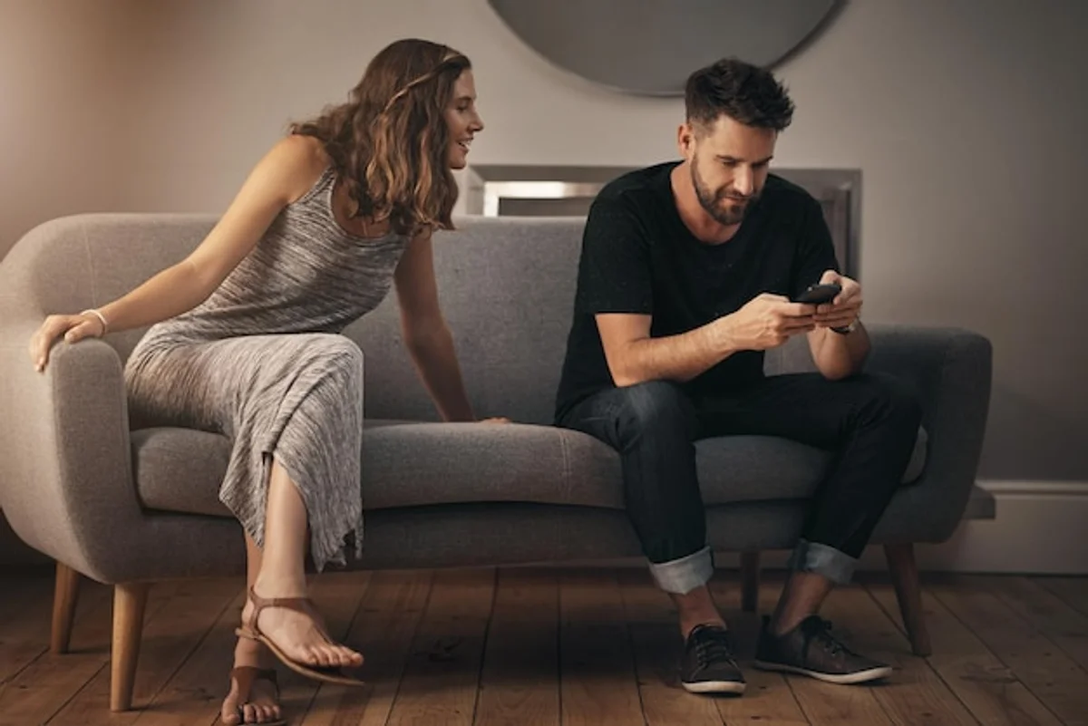 partner couple jealousy checking smartphone
