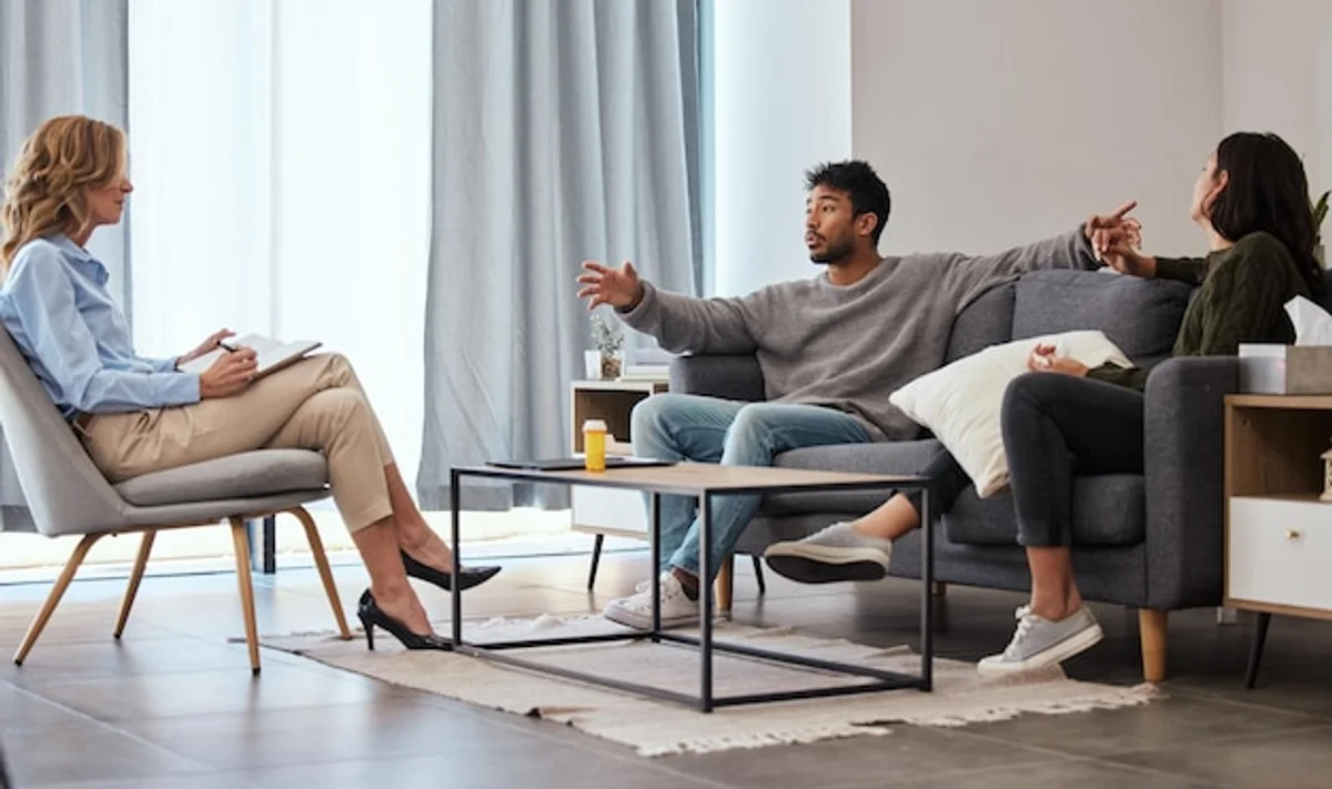 conflict resolution couple communicating living room