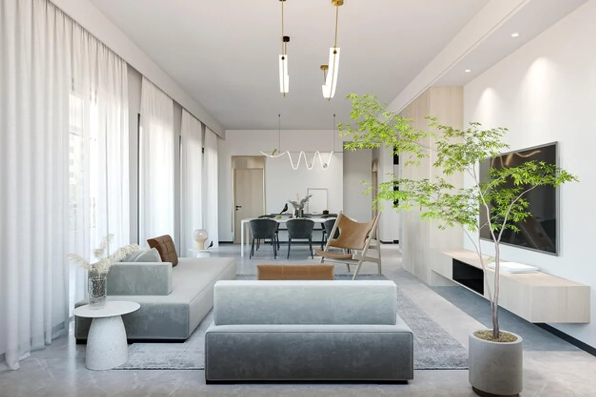 minimalist living room with plants and natural light