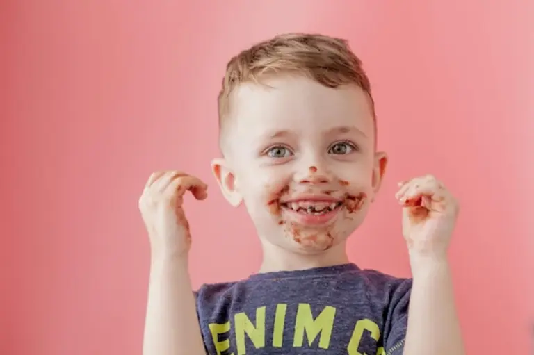 cute toddler with chocolate smeared face