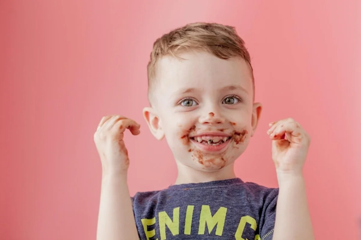 cute toddler with chocolate smeared face