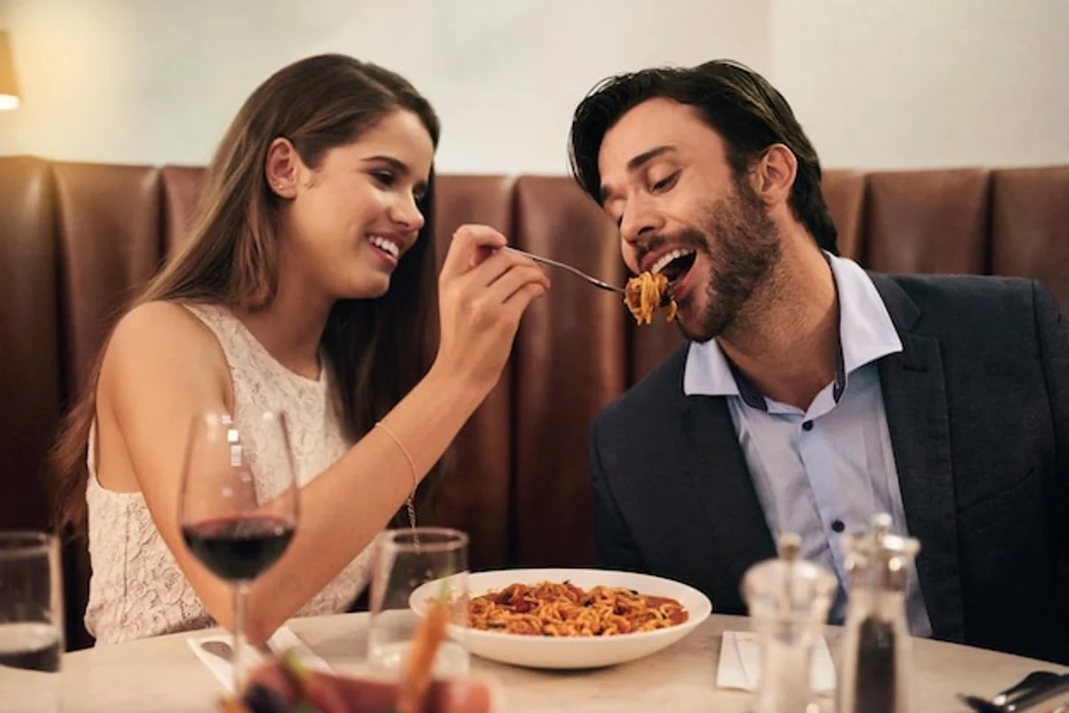 date couple trying unusual food tasting event