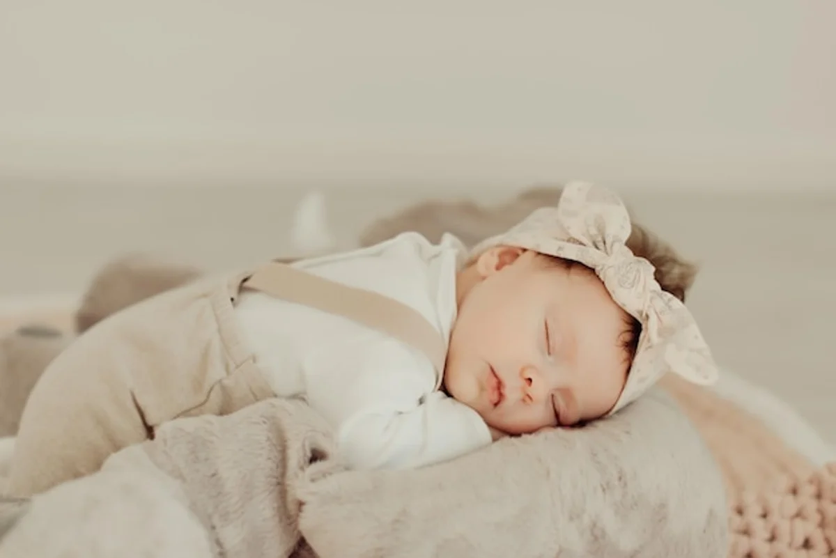 Sleeping newborn close-up, soft natural light