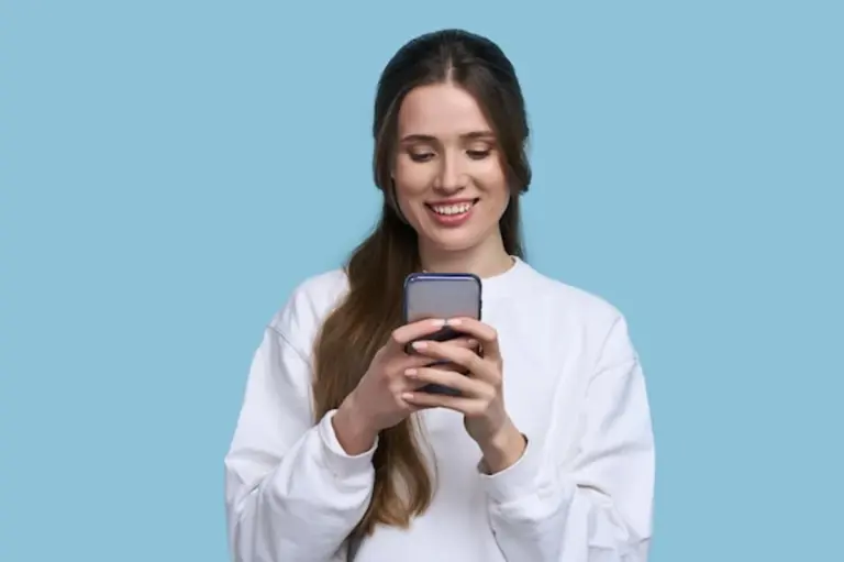 young woman checking her smartphone for app subscriptions