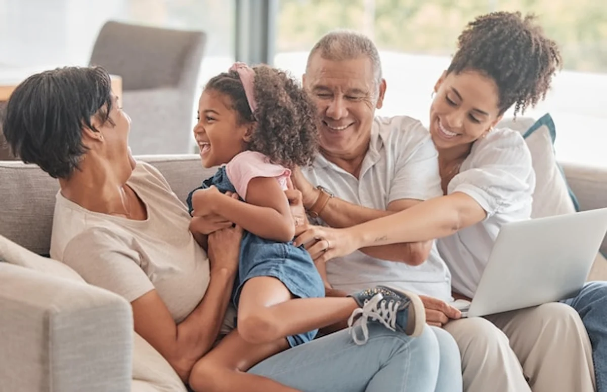 family sharing streaming services laptop couch