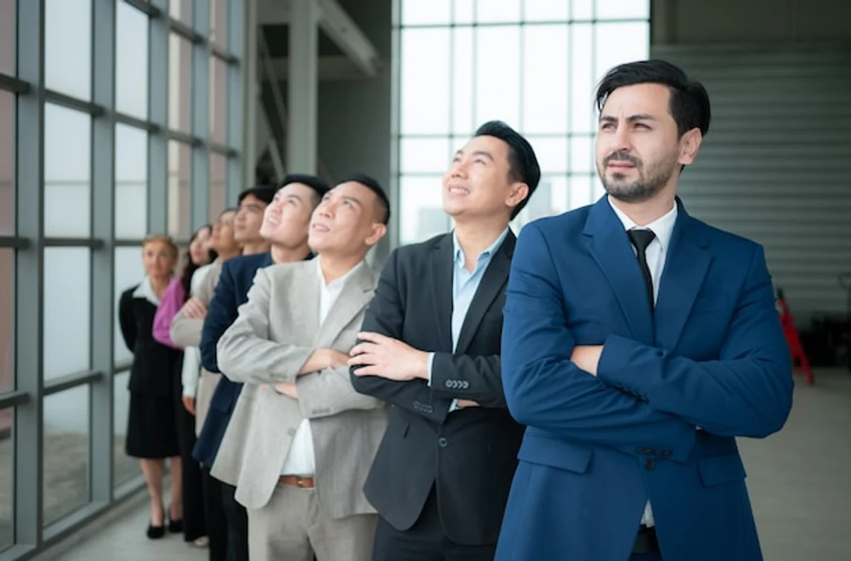 people standing in a modern office during a meeting