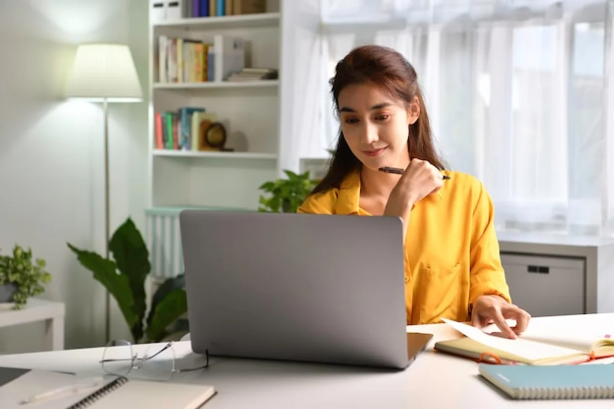 young professional studying online course at home