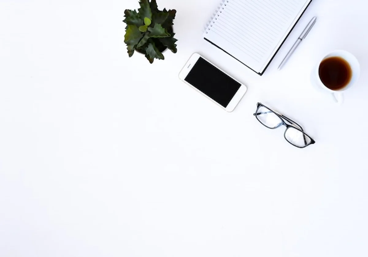 old notebooks on desk minimalistic flat lay