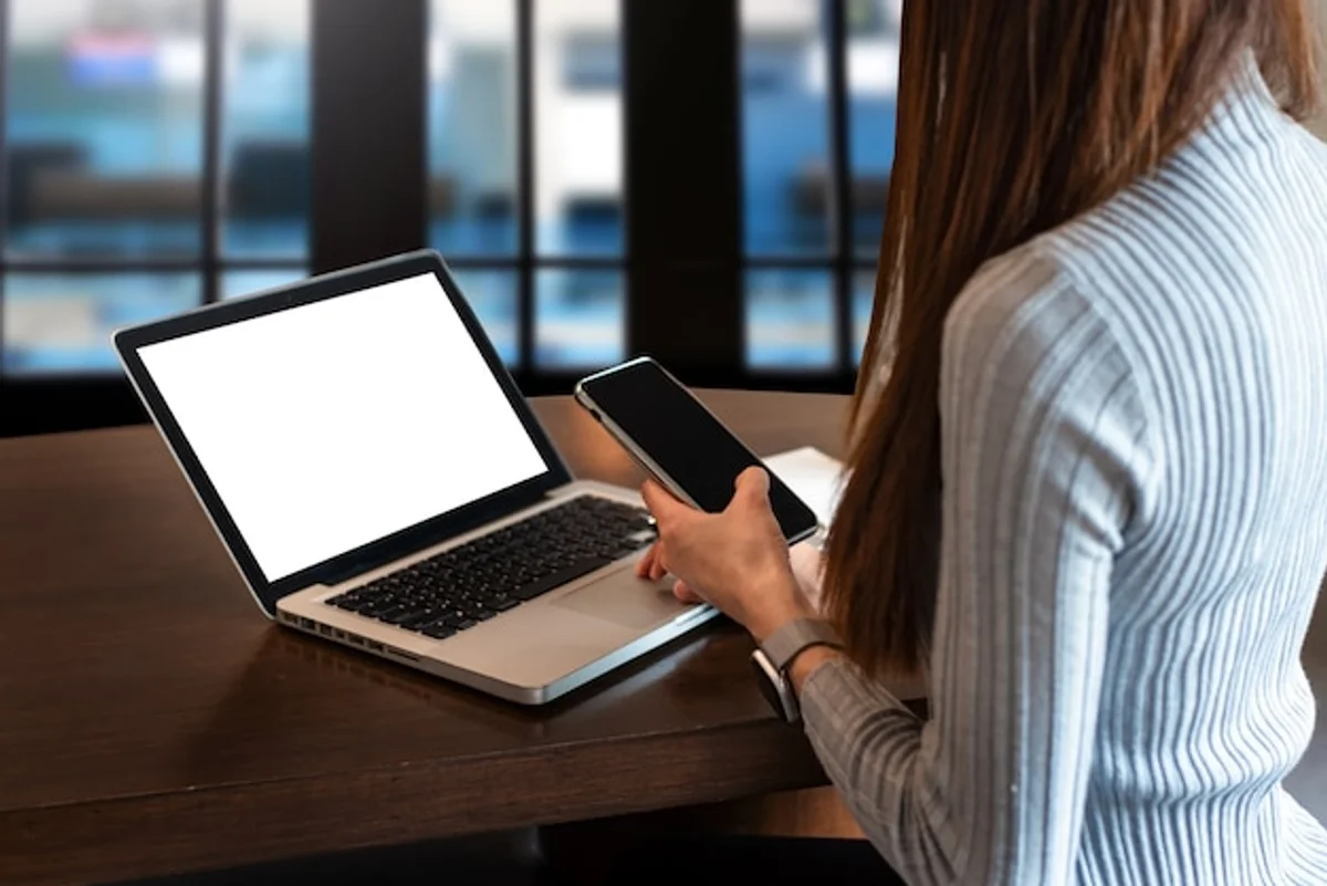 person studying in morning light home office