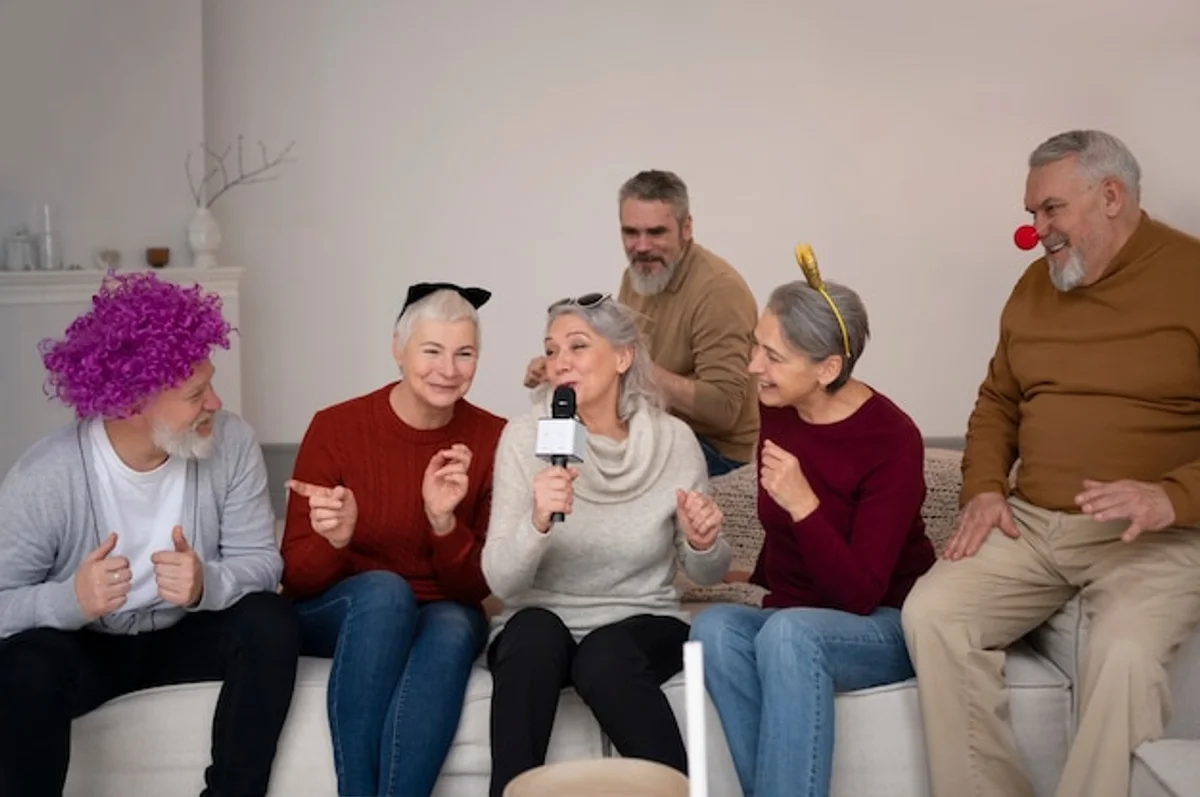 retired men and women in Germany doing creative group activity, laughing