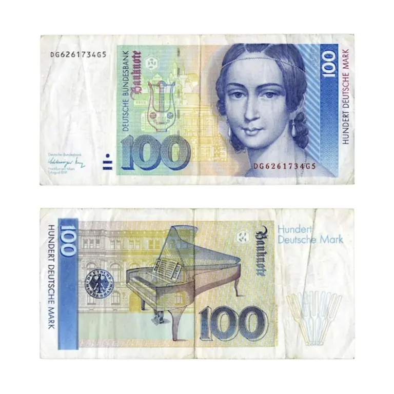 modern german woman tracking daily expenses smartphone