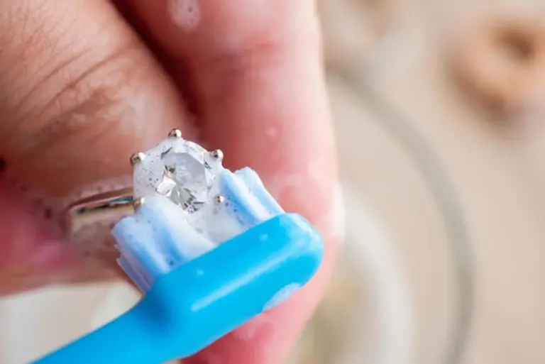 old toothbrush cleaning nails macro