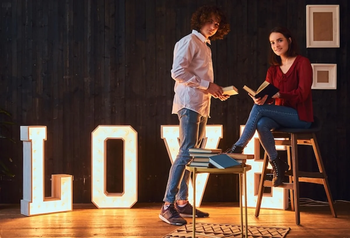 couple reading love letters together at home