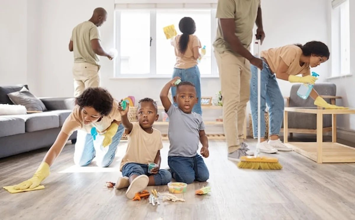 children cleaning together home teamwork playful