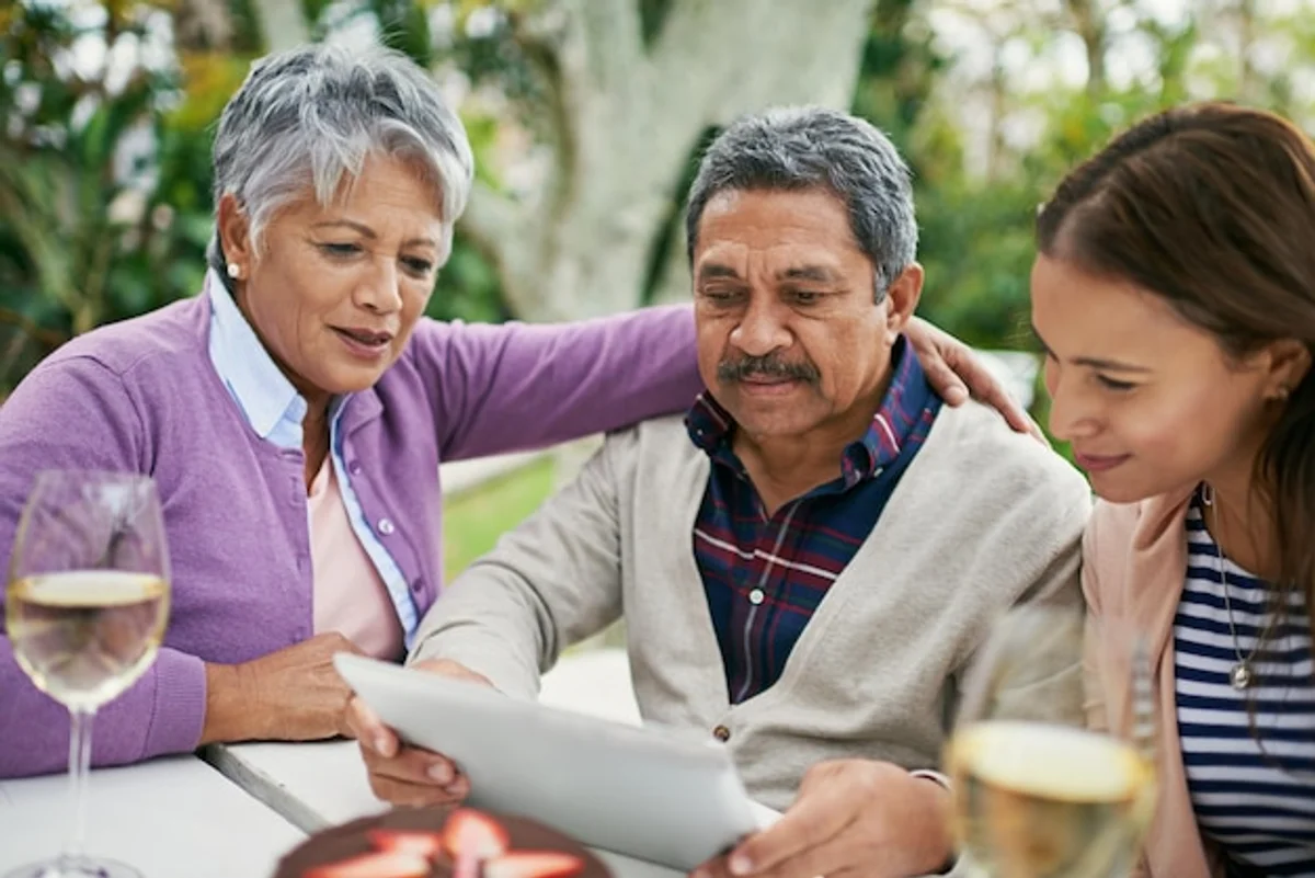 family reading old letters together at home