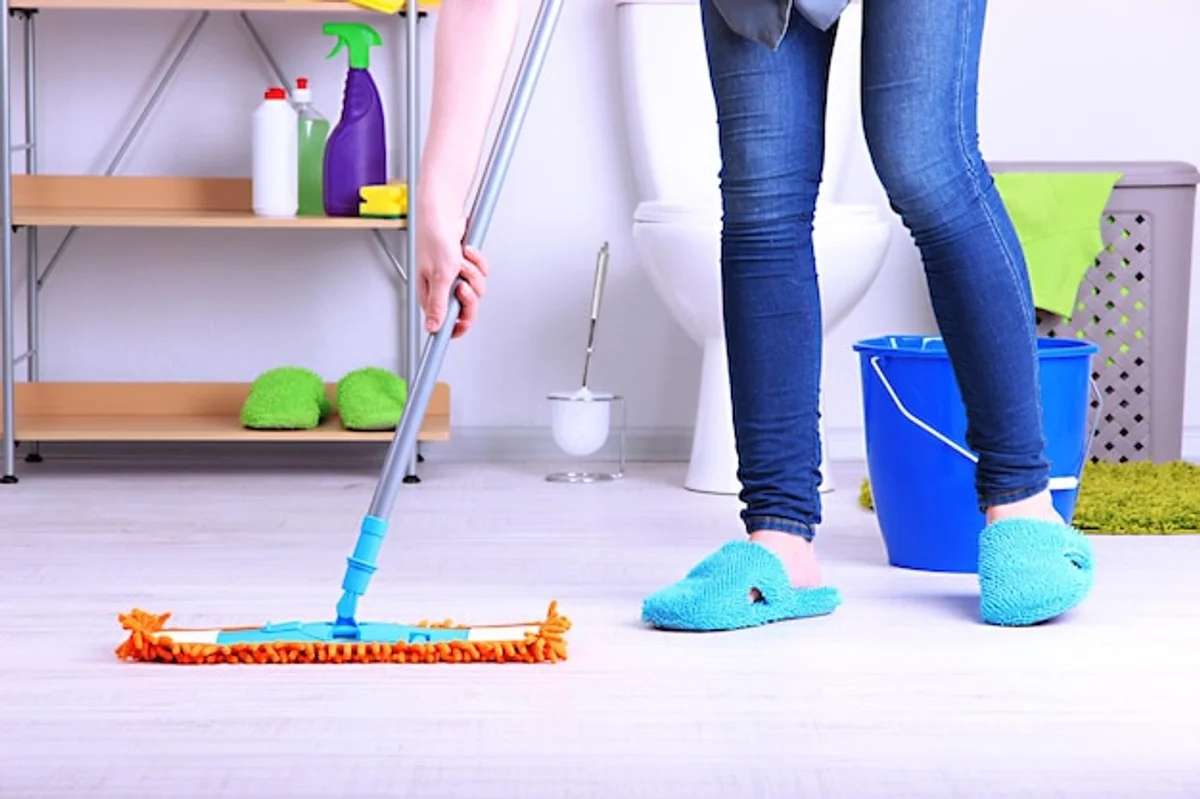 kids cleaning floor with microfiber cloths