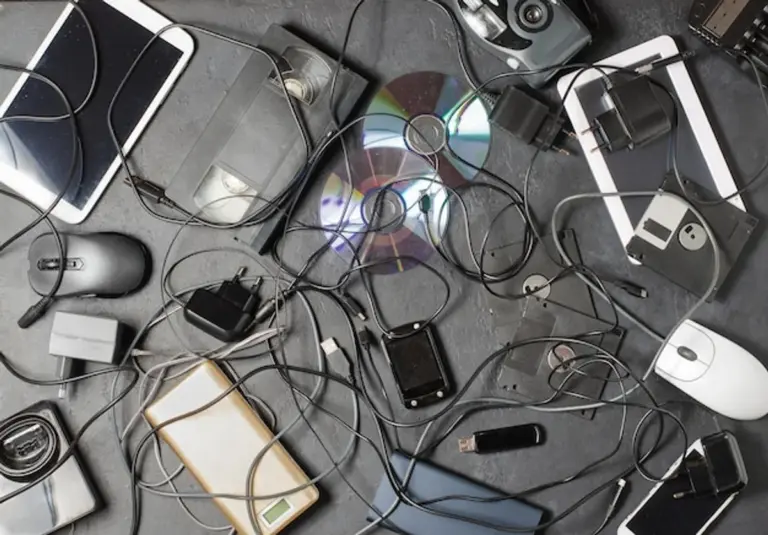 old powerbank with smartphone and accessories